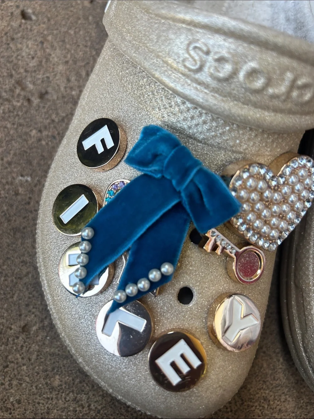CROCS Kids Gold Glitter Clogs with Blue Velvet Charms